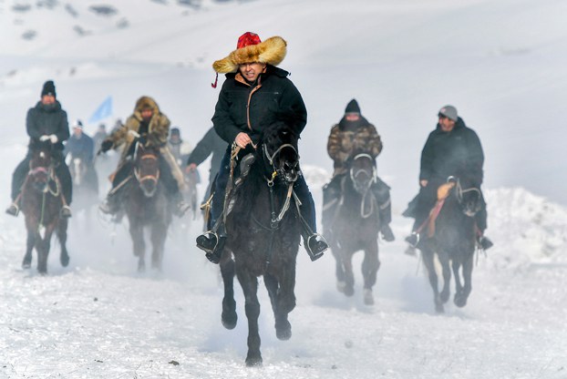 ENG_UYG_LunarNewYear_01292024.2.jpg Herdsmen attend a horse race to welcome the upcoming Lunar New Year in Urumqi, capital of northwest China’s Xinjiang region, Jan. 27, 2024. (Liu Xin/China News Service/VCG via Getty Images)