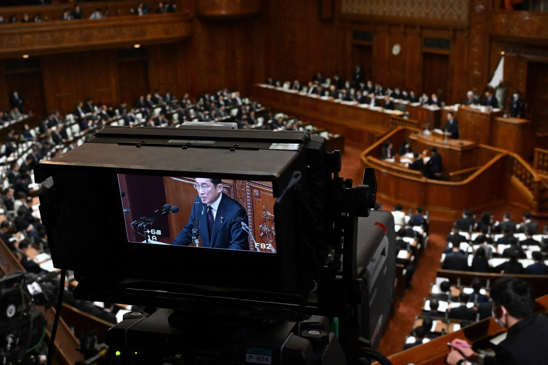 Japan’s Prime Minister Fumio Kishida delivers a policy speech at the National Diet in Tokyo on Tuesday