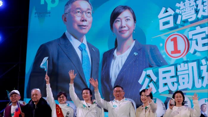 Taiwan People’s party presidential candidate Ko Wen-je, third from right, cheers with his running mate Cynthia Wu, fourth from left, during a campaign event in Taipei on Friday