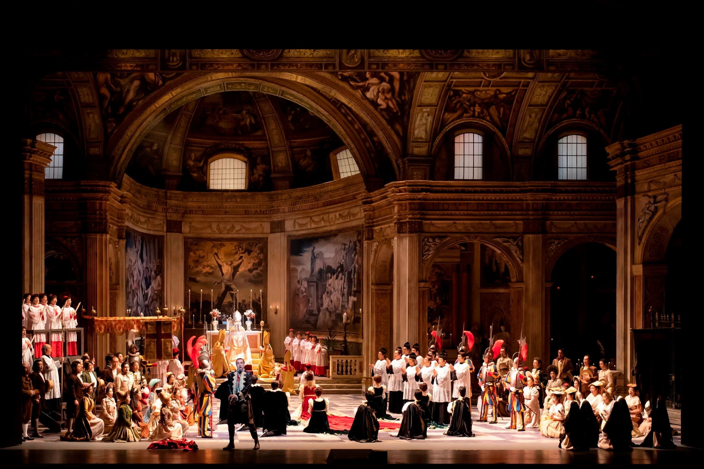 The cast of the Italian opera director Antonello Madau-Diaz’s ‘Tosca’ on stage in a set designed to look like a Roman chapel