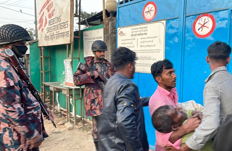 ENG_BUR_AACaptureCamp_02052024.2.jpg Local people bring a man wounded by a gunshot to Médecins Sans Frontières (Doctors Without Borders) in Ukhia, Bangladesh, Feb. 4, 2024. (Tanbir Miraj/AFP)