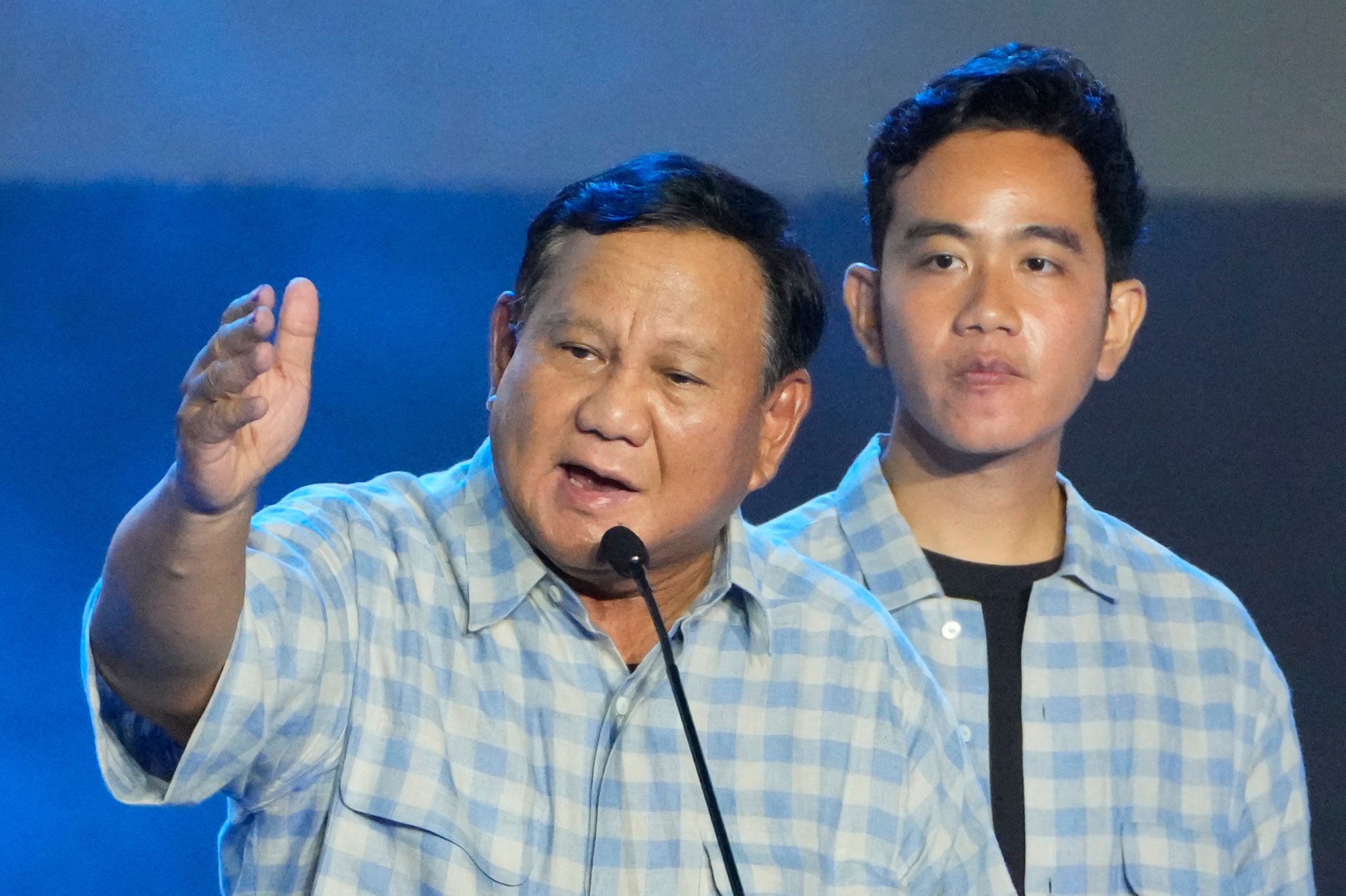 Prabowo Subianto, left, and his running mate Gibran Rakabuming Raka, the son of President Joko Widodo. Prabowo has pledged to continue the legacy of the man widely known as Jokowi. Photo: AP