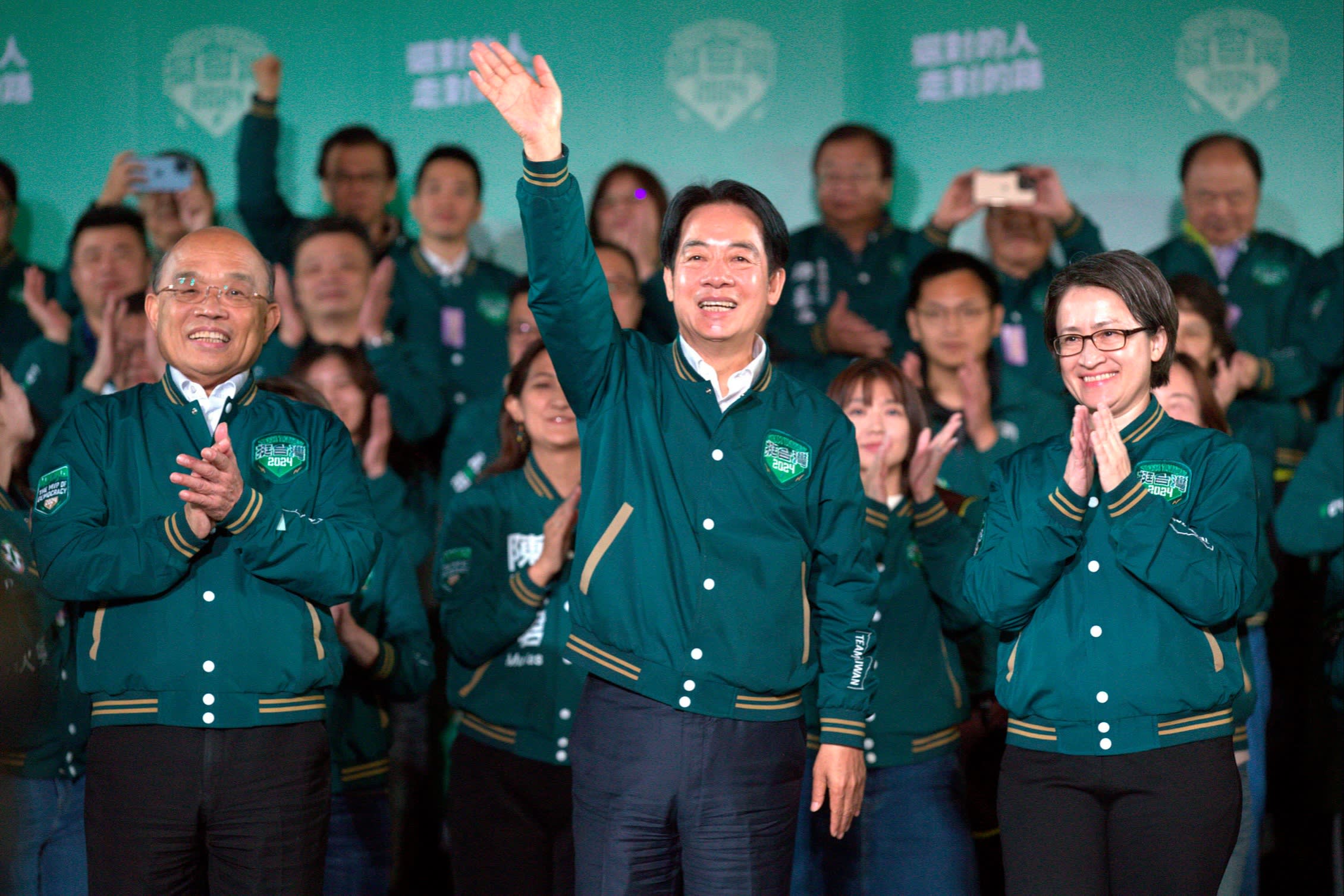 Lai Ching-te, centre, celebrates his election victory with supporters in Taipei in January