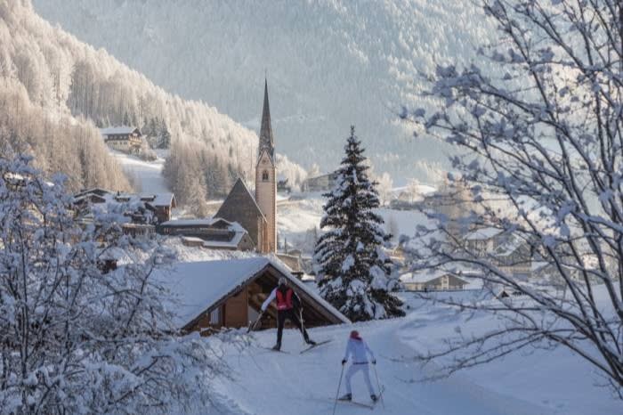 The Church of St Vincent, with the Grossglockner visible to the right of the spire