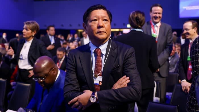 Marcos in a conference hall