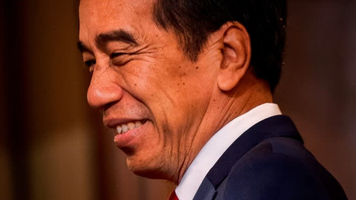Close up three quarters view of a smiling Joko Widodo