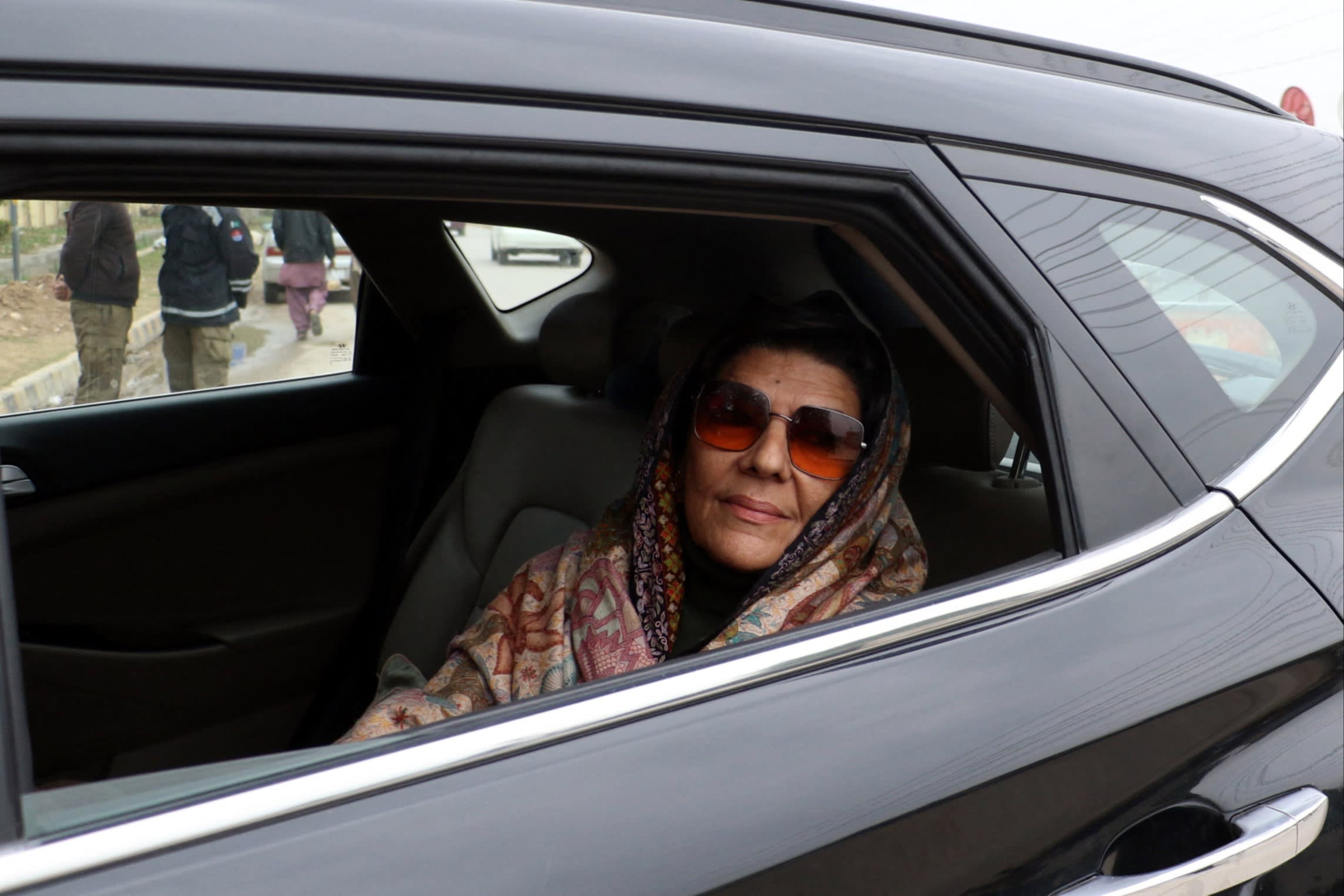 Aleema Khan in a car arriving for a visit to her brother in prison in early February