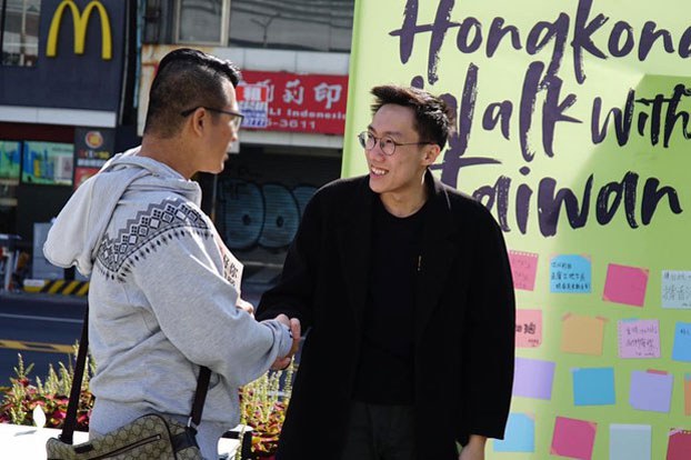 INTERVIEWSArticle23_02142024.jpg Hong Kong democracy activist Lo Tzu-wei (R) campaigns in democratic Taiwan, in an undated photo. (Courtesy of Lo Tzu-wei)