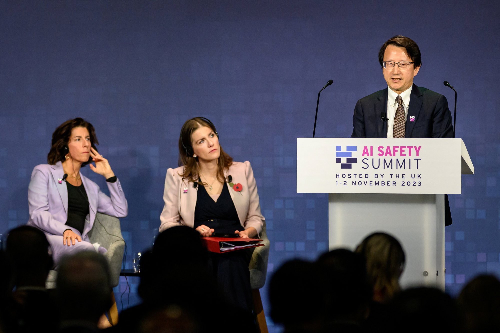 US Secretary of Commerce Gina Raimondo (left) and British Secretary of State for Science, Innovation and Technology Michelle Donelan listen as Chinese vice-minister of science and technology Wu Zhaohui speaks at the AI Safety Summit at Bletchley Park in Britain on November 1. Photo: Reuters