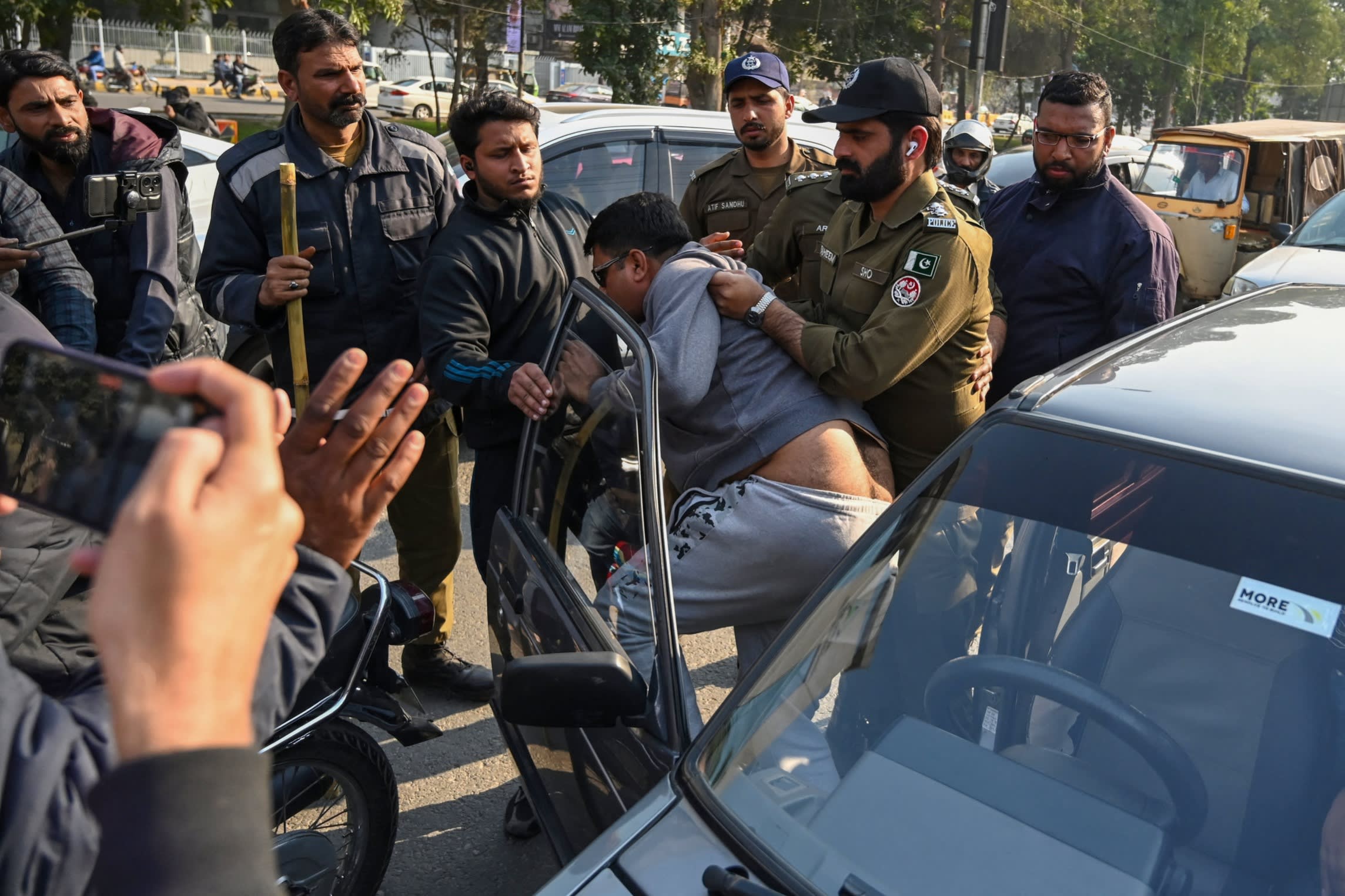 Police detain supporters of Imran Khan’s Pakistan Tehreek-e-Insaf party after a post-poll protest