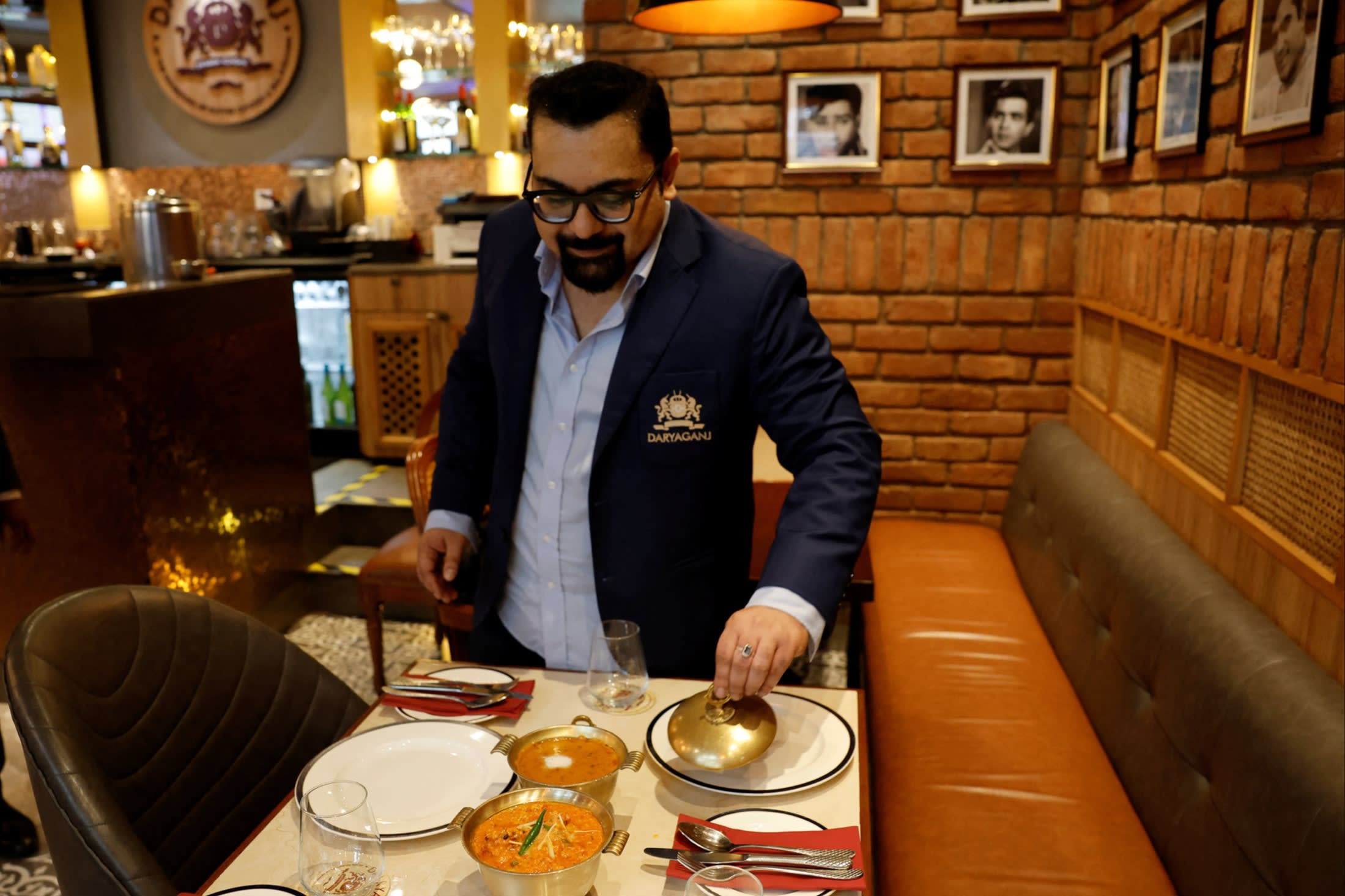 Amit Bagga shows off Daryaganj’s butter chicken and dal makhani