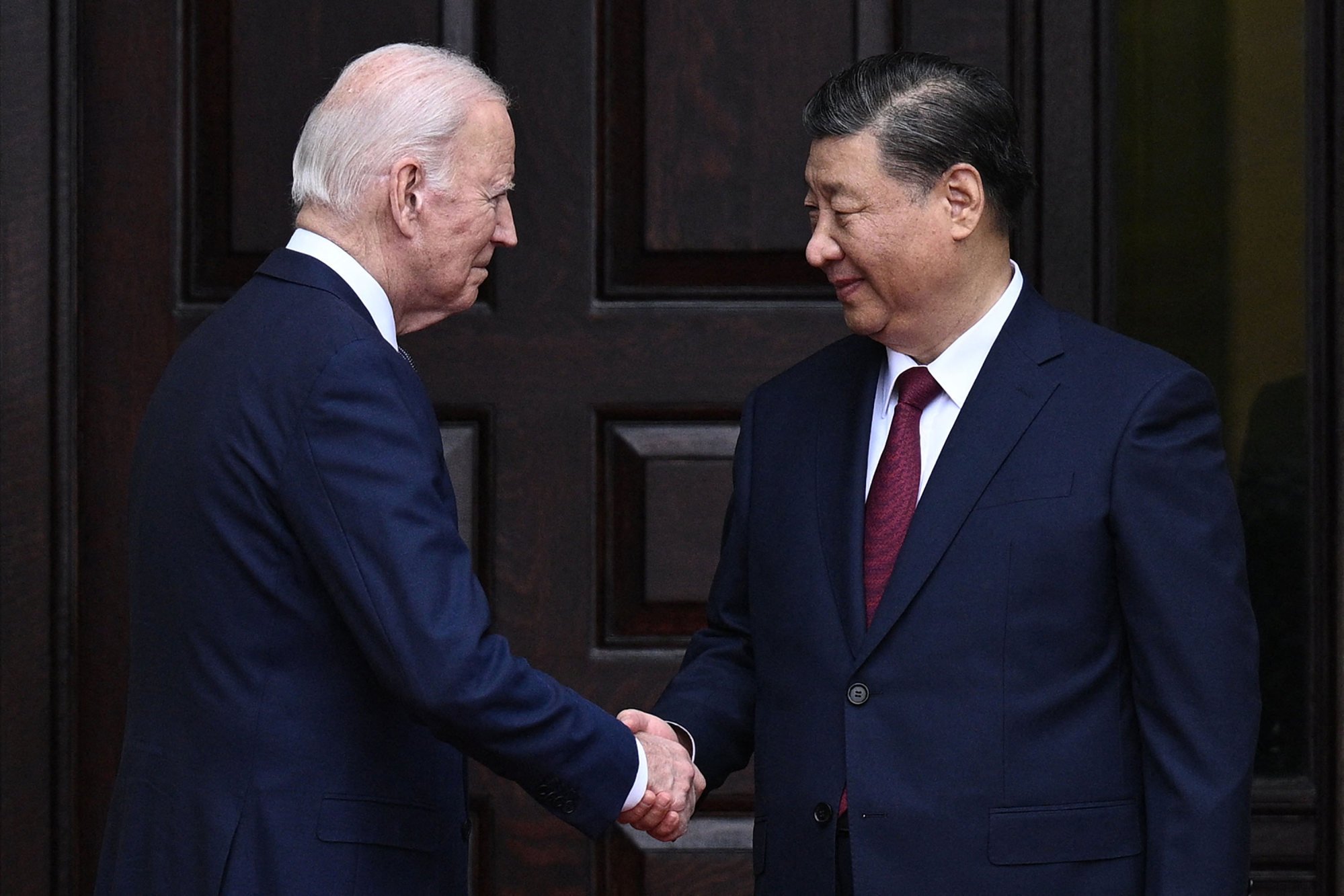 US President Joe Biden greeting Chinese President Xi Jinping during the Asia-Pacific Economic Cooperation leaders’ week in Woodside, California on November 15, 2023. Photo: AFP/Getty Images/TNS