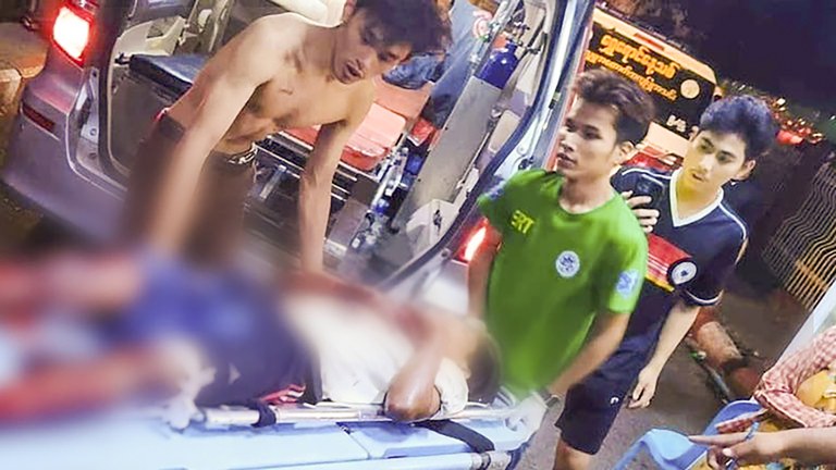 ENG_BUR_BombBlast_03282024.2.jpg Patients injured in a bomb blast near Sule Bridge are transported to Yangon Hospital. Blurring in photo is from source. (Citizen Journalist)