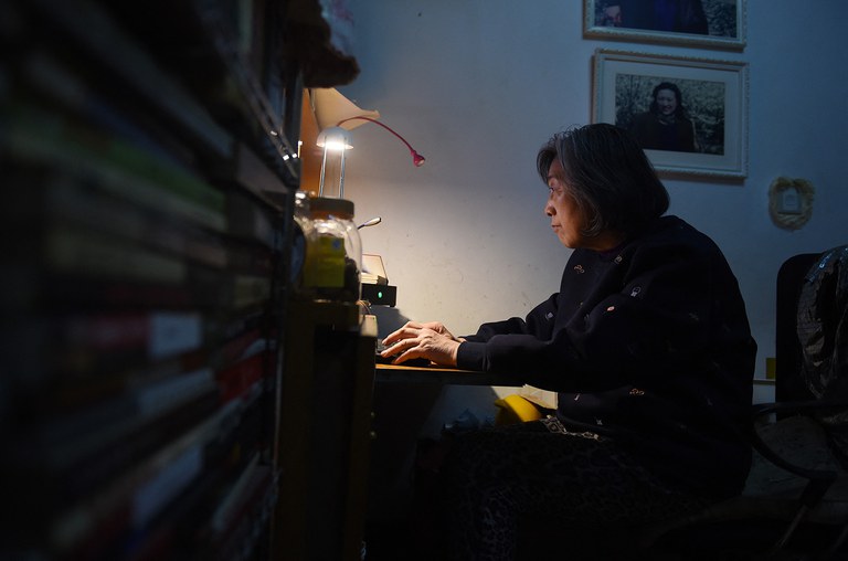 ENG_CHN_FEATURESensitiveDates_03132024.4.jpg Veteran Chinese journalist Gao Yu works at her desk in her home in Beijing on March 31, 2016. (Greg Baker/AFP)