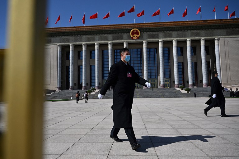 ENG_CHN_FEATURESensitiveDates_03132024.2.jpg Security personnel walk outside the Great Hall of the People after the second plenary session of the 14th National People’s Congress in Beijing on March 8, 2024. (Jade Gao/AFP)