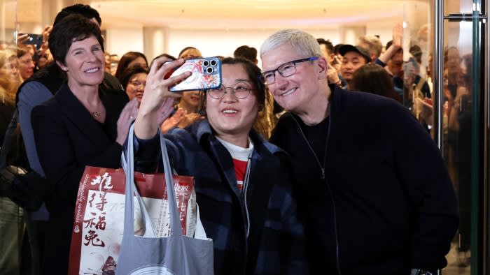 Apple chief Tim Cook attends the opening of a new Apple store in Shanghai on Thursday