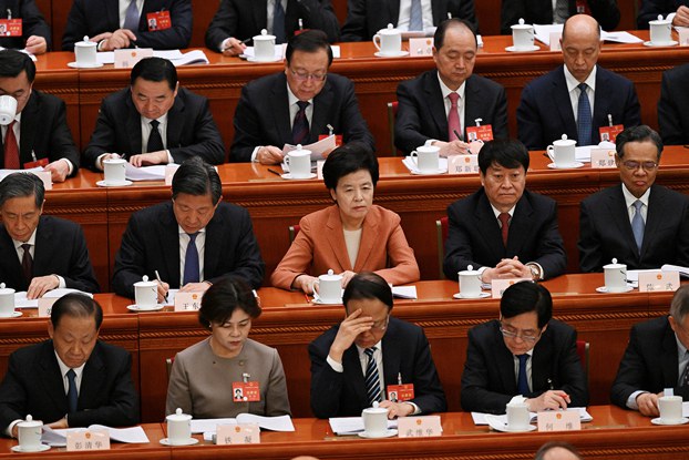 Delegates attend the second plenary session of the 14th National People’s Congress at the Great Hall of the People in Beijing, March 8, 2024. (Pedro Pardo/AFP)