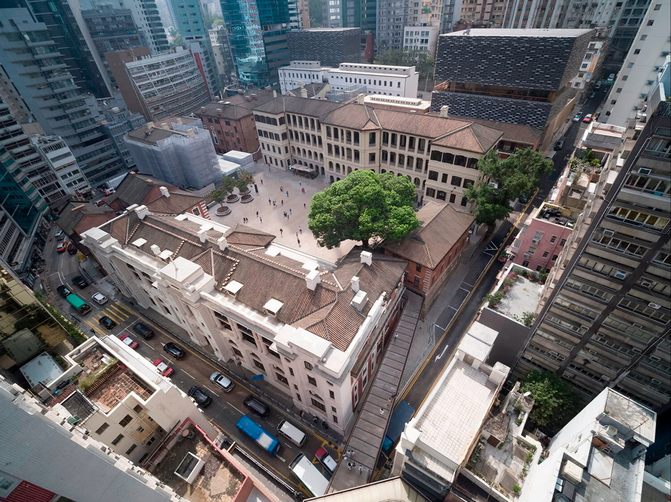 Aerial view of two colonial buildings around a courtyard