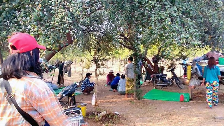 ENG_BUR_JuntaFighting_03062024.3.jpg Displaced people from Kani township, Sagaing region, rest under trees, March 20, 2023. (Pyae Aung Naing – Kani)