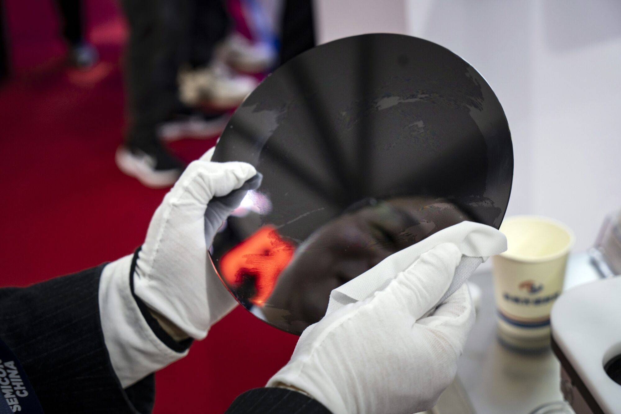 A semiconductor wafer on display at Semicon China. Photo: Bloomberg