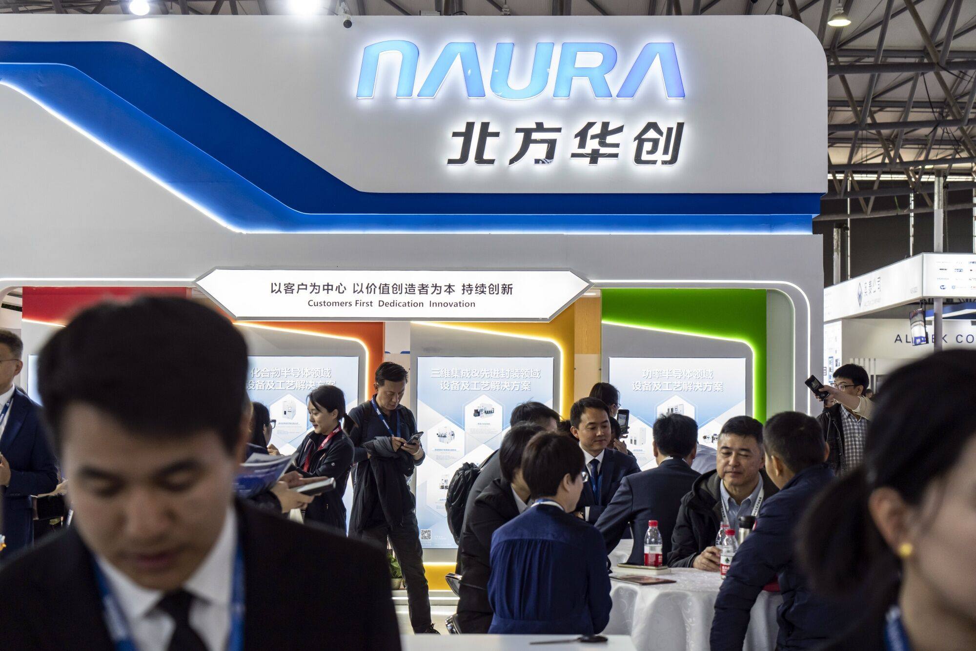 The booth of Naura, a Chinese chip equipment maker, at Semicon China. Photo: Bloomberg
