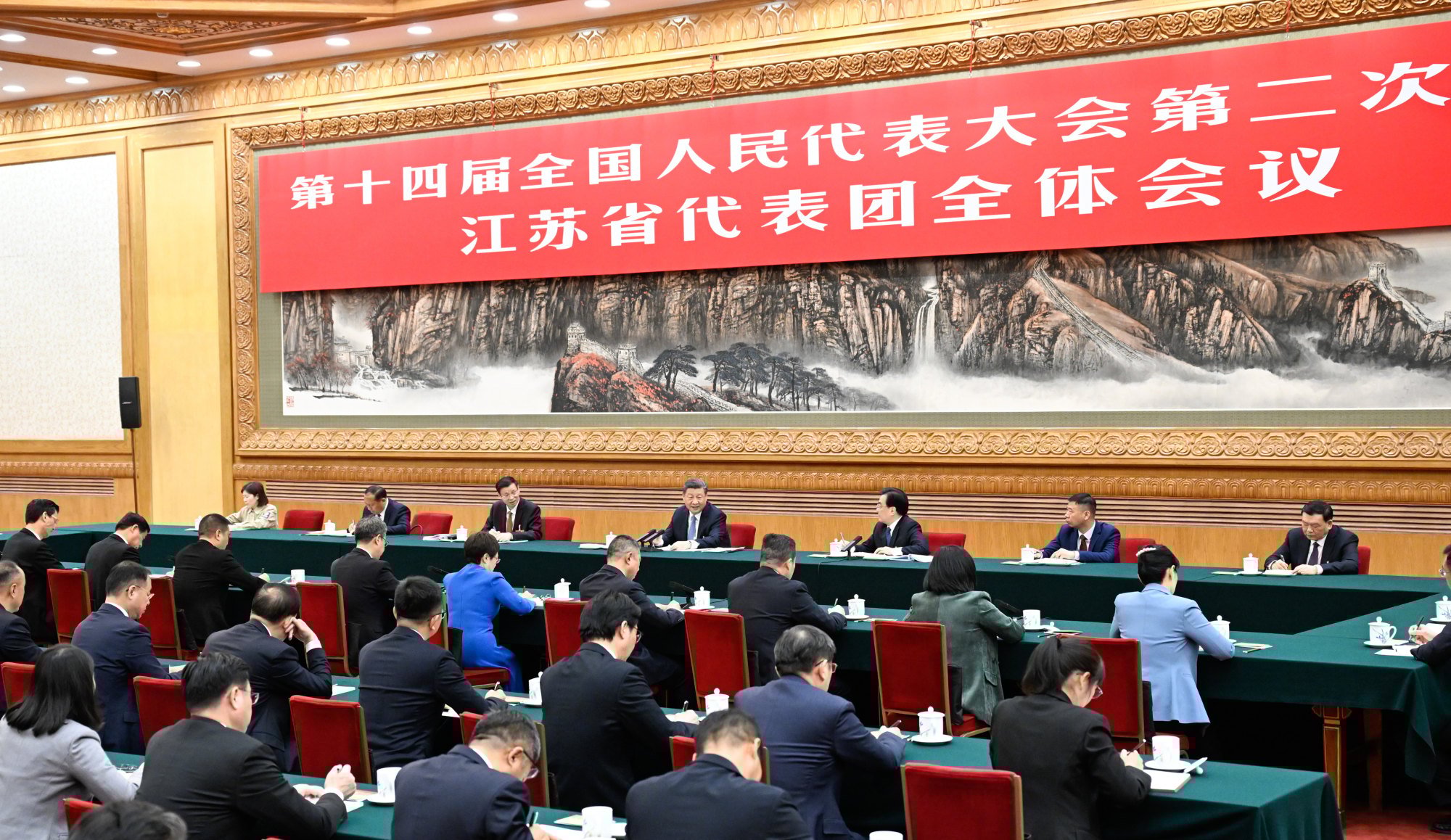 The discussion of the Jiangsu Province delegation, with Xi Jinping seated at the centre of the table, on March 5, 2024. Photo: Xinhua