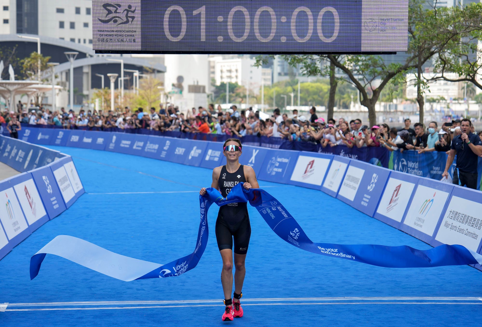 Sian Rainsley won the Hong Kong leg of the World Triathlon Cup, but the wrong national anthem was played after she received her gold medal. Photo: Elson Li