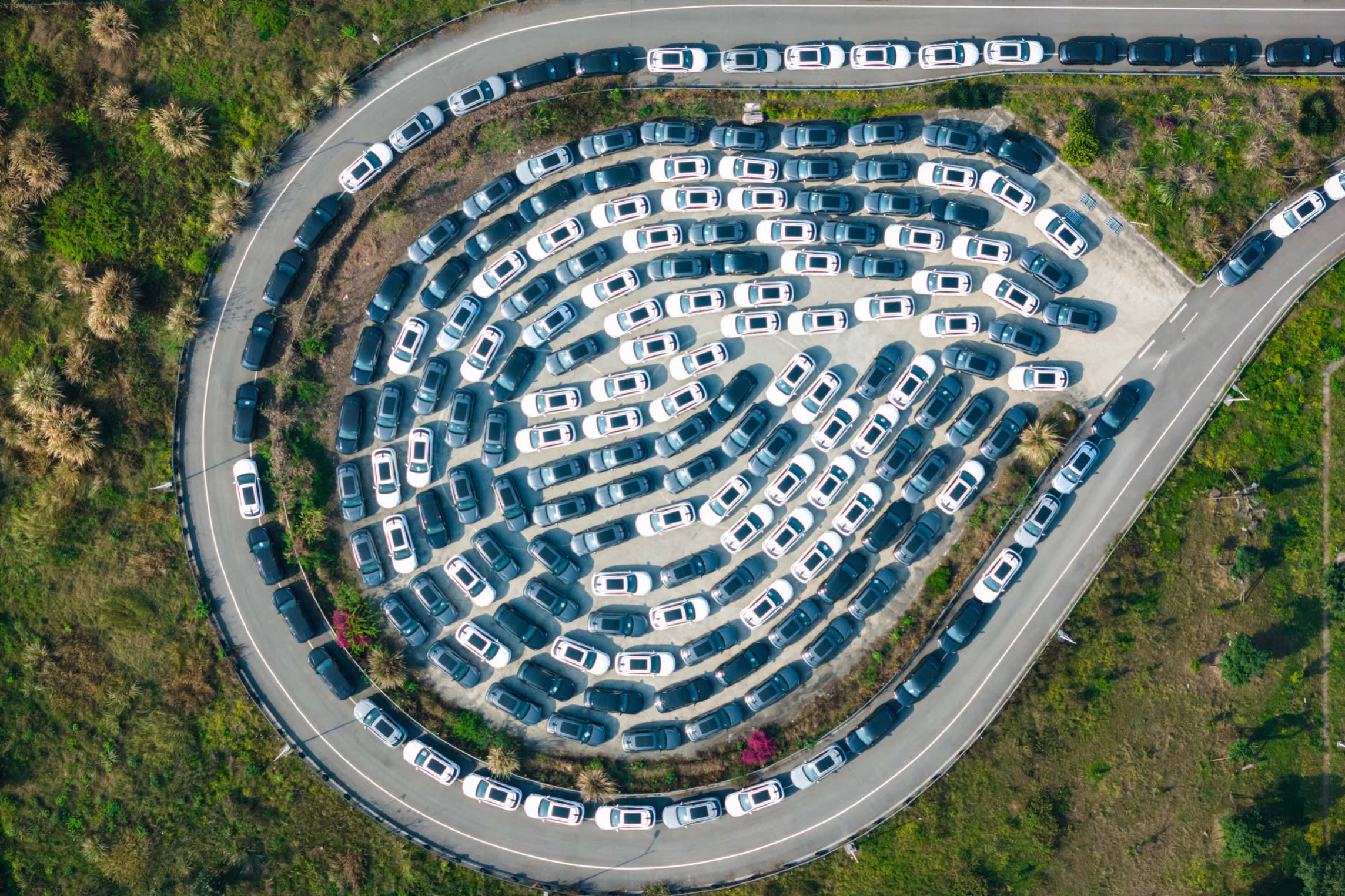 Electric cars are parked at a distribution centre in Chongqing. The US and EU have launched probes into China’s EV industry, the former targeting security risk and the latter over claims of unfair state support