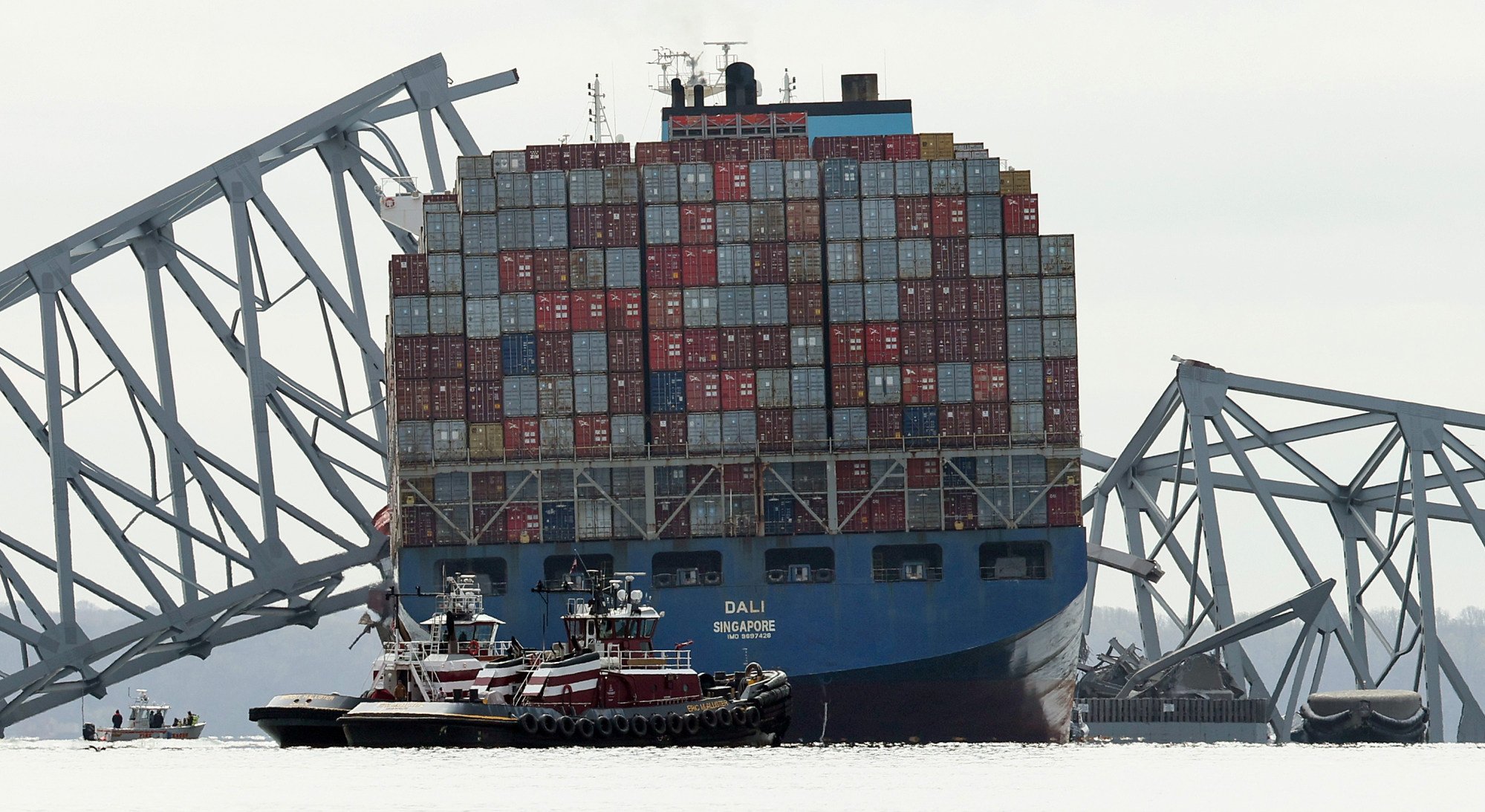 The Dali sits in the water after running into and collapsing the Key Bridge in the Port of Baltimore on March 26. Photo: Getty Images/TNS