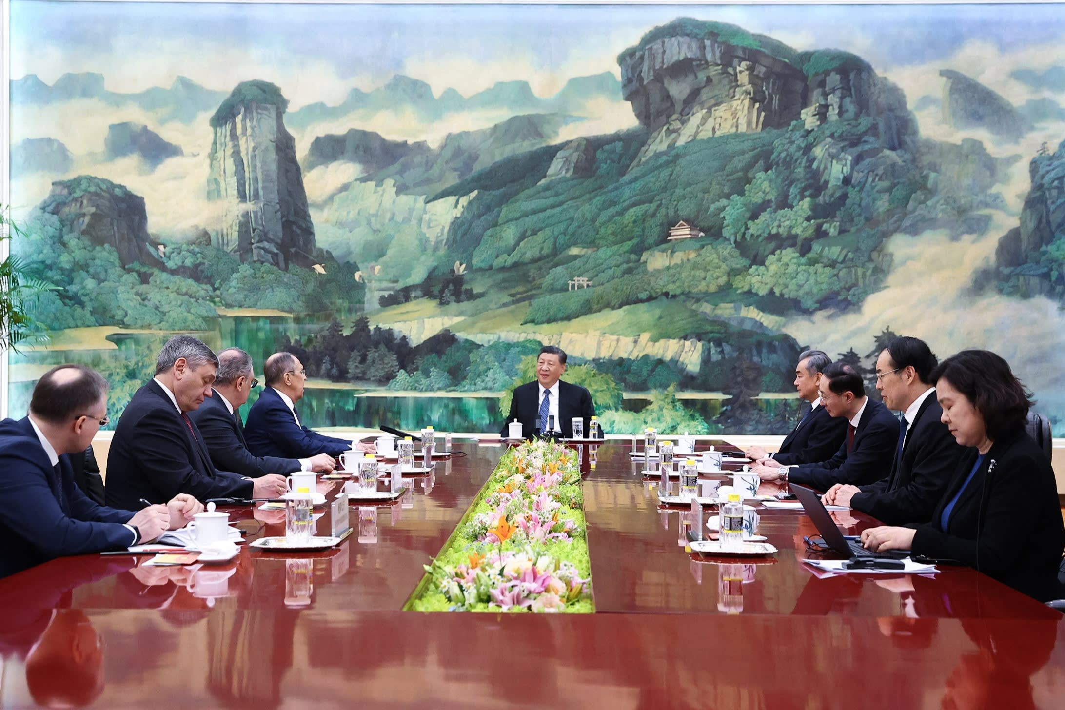 Chinese President Xi Jinping, centre, meets Russian foreign minister Sergei Lavrov, to his right, in Beijing on Tuesday