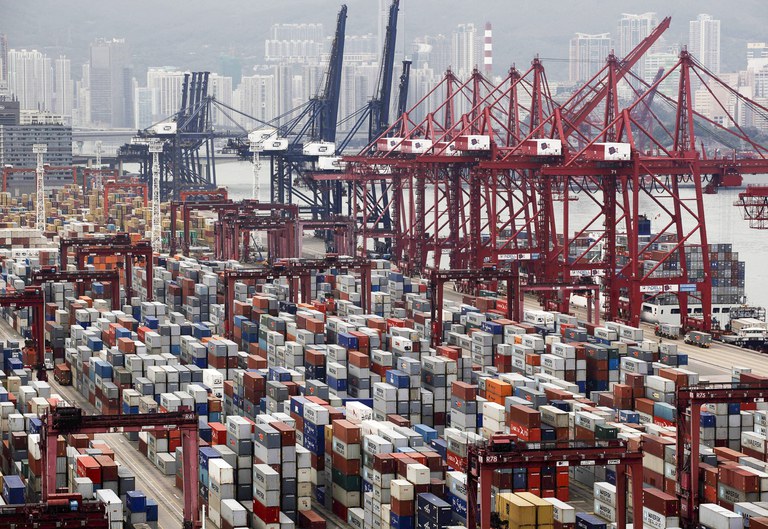 ENG_CHN_ANALYSISHK_Shipping_04172024.30.JPG Shipping containers stack at the Kwai Chung terminal at Hong Kong's port on Tuesday, April 7, 2009.(Vincent Yu/AP)