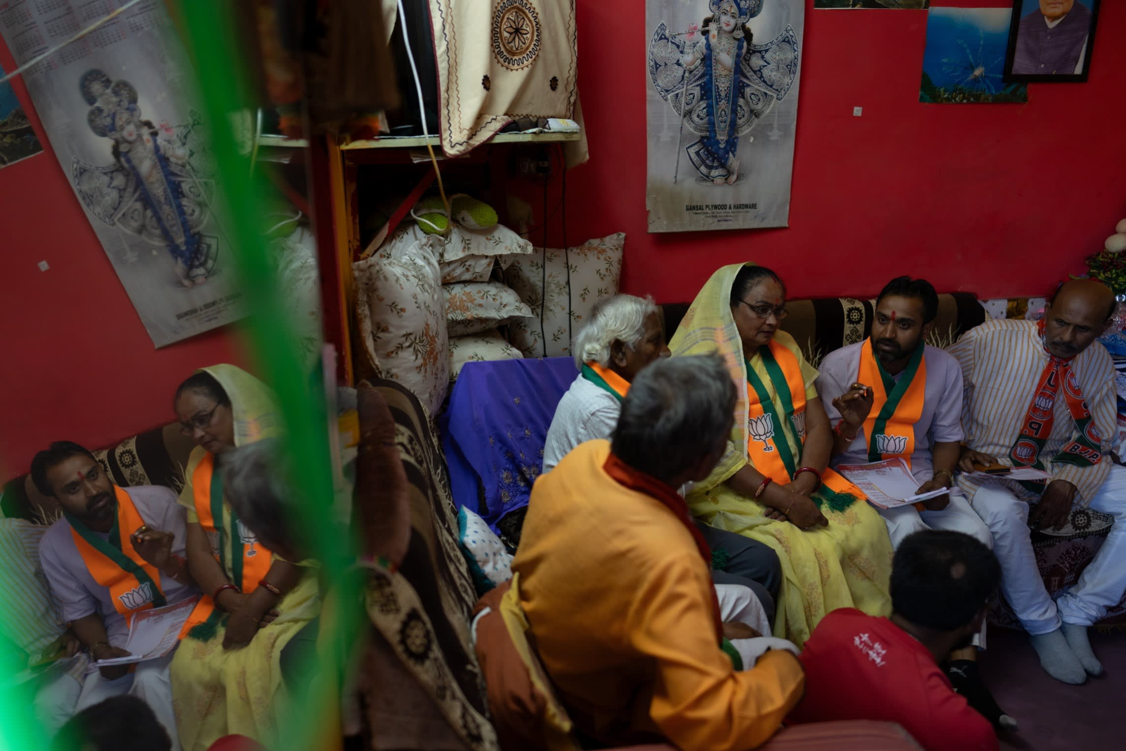 The BJP’s Lakshmi Prakash Gorewar and Dimple Shrivastava talk to voters in Bhopal. The party has cultivated an army of workers like Gorewar, who is from a lower caste, to act as a bridge between the government and ordinary Indians
