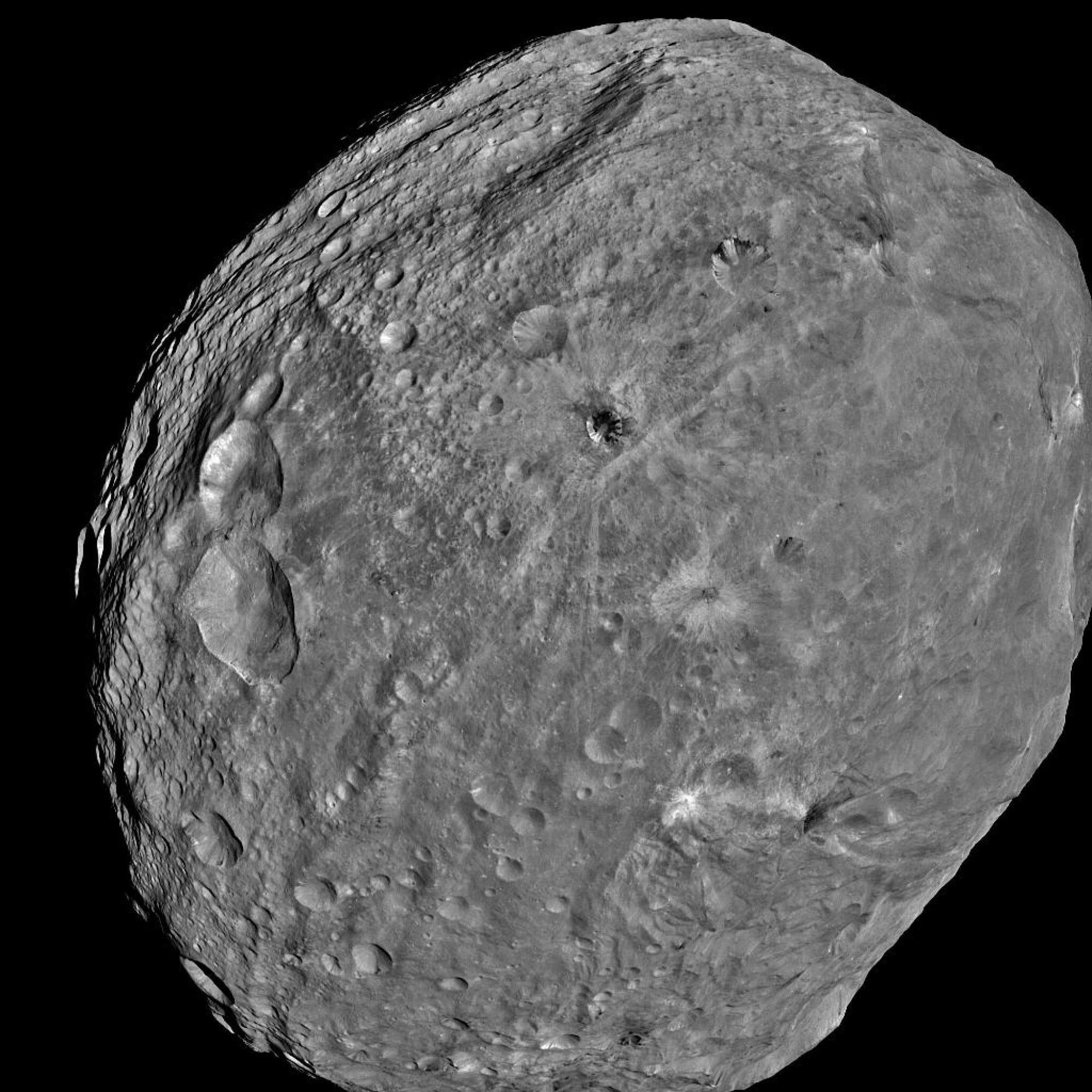 The surface of the asteroid shows the signs of collisions with planetary objects and space debris when the solar system was taking shape. Photo: AP/ Nasa/JPL