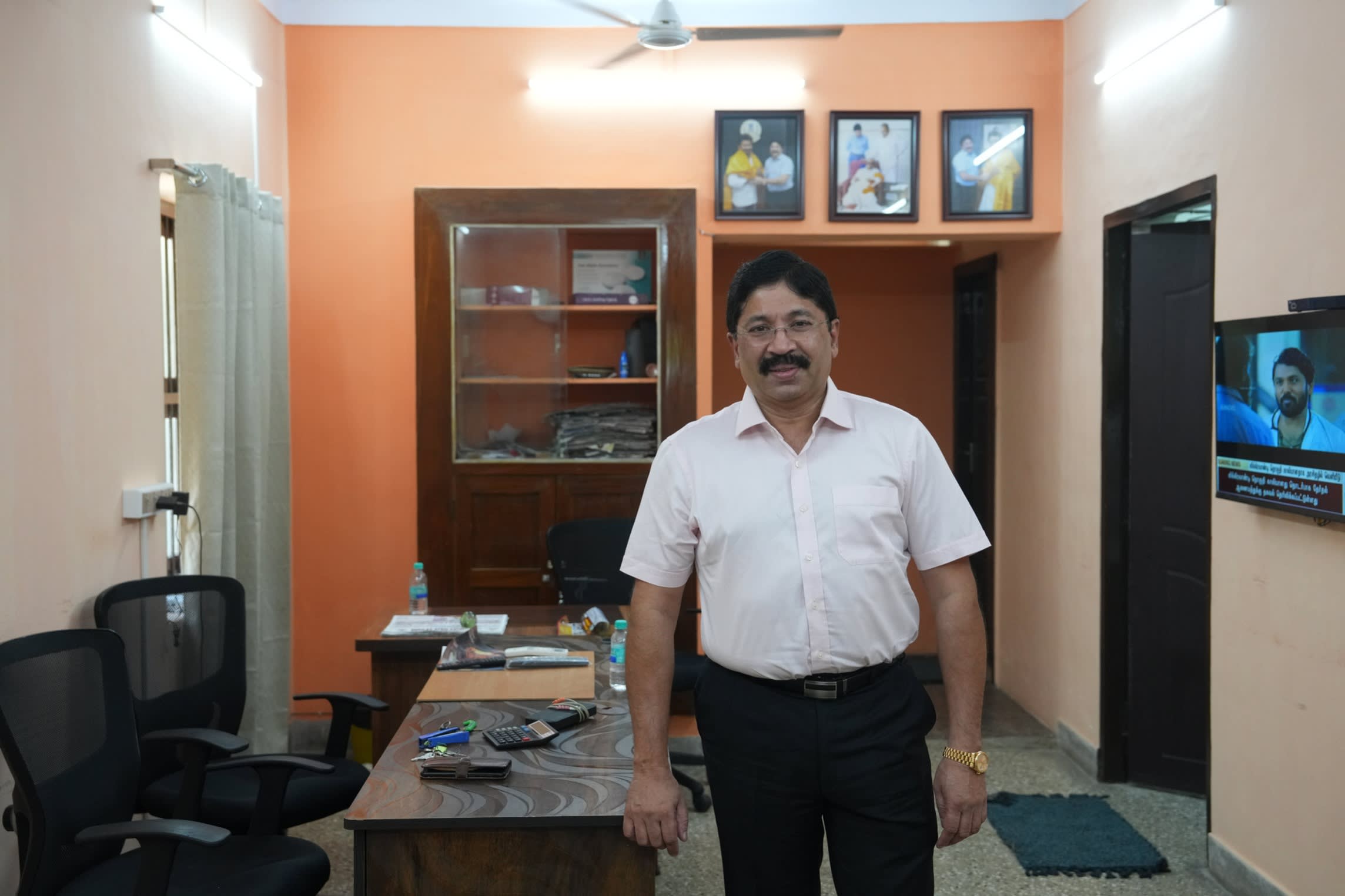 Dayanidhi Maran standing in his office
