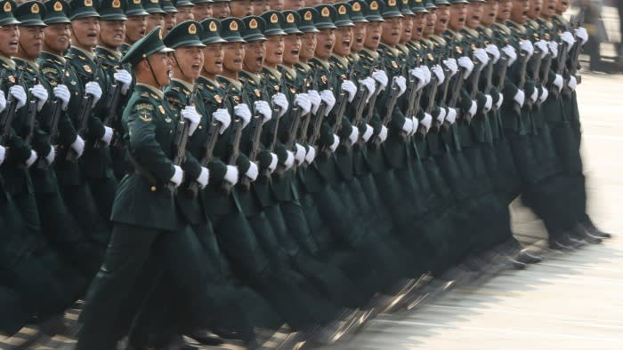 Soldiers of the People’s Liberation Army march during a parade to celebrate the 70th anniversary of the founding of the People’s Republic of China at Tiananmen Square on October 1 2019