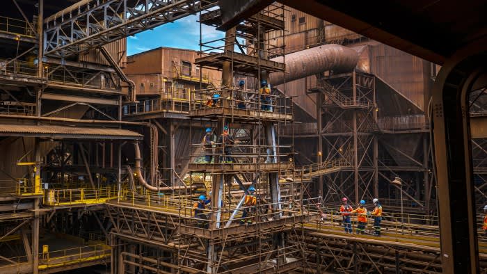 Workers at a nickel processing plant operated by PT Vale Indonesia