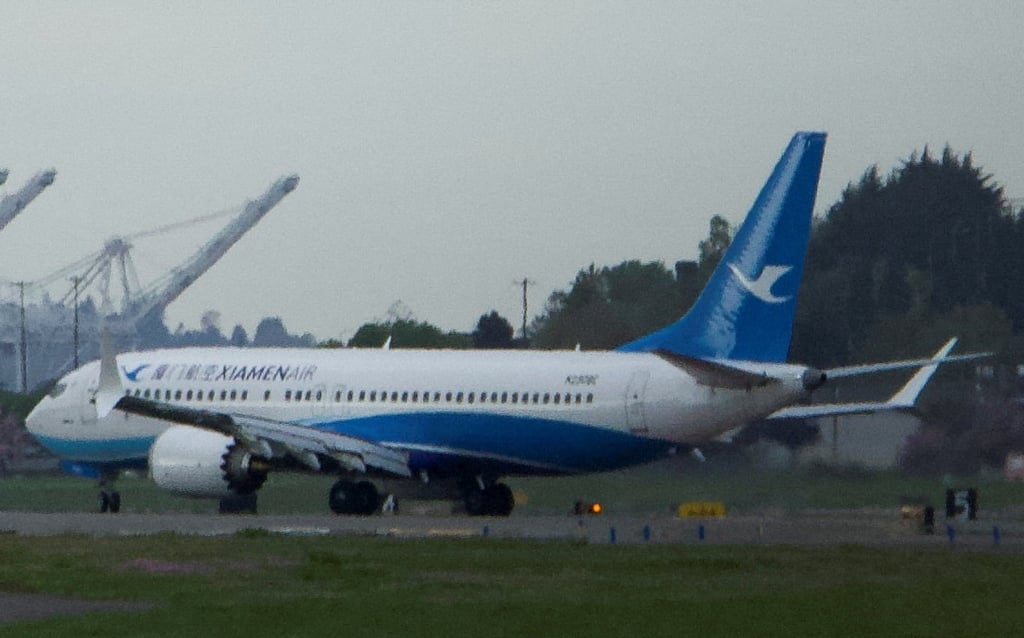A Boeing 737 Max plane, intended for China’s Xiamen Airlines, arrives at Seattle’s King County International Airport on Saturday after returning from China due to ongoing tariff disputes. Photo: Reuters A Boeing 737 Max plane, intended for China’s Xiamen Airlines, arrives at Seattle’s King County International Airport on Saturday after returning from China due to ongoing tariff disputes. Photo: Reuters