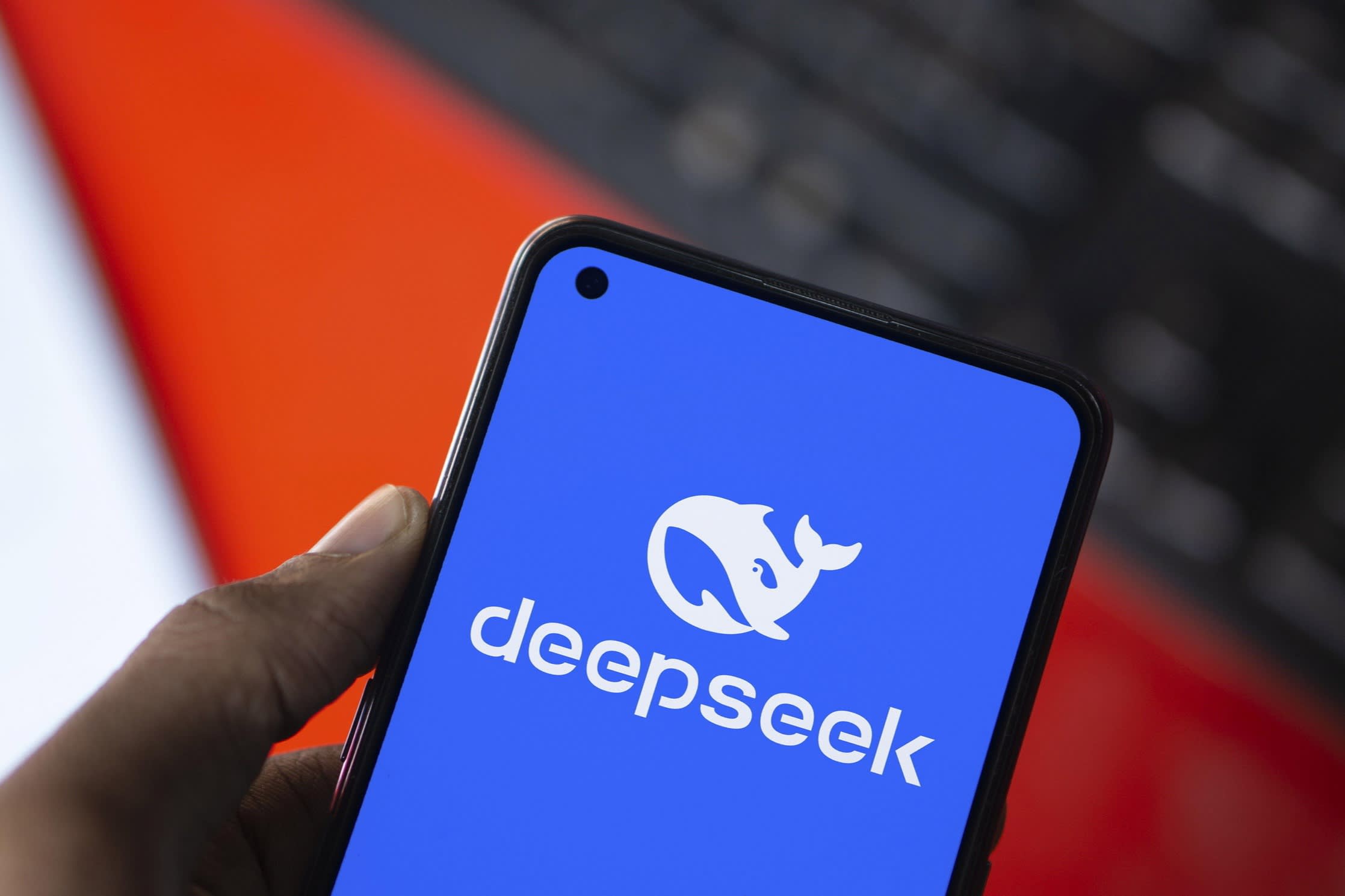 Deepseek logo is displayed on smartphone