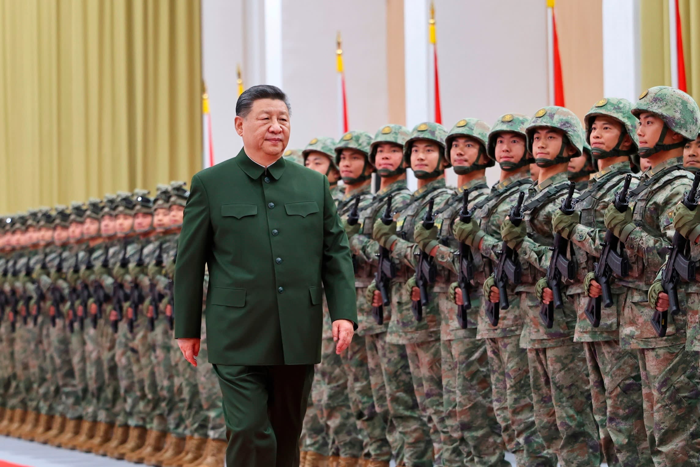 Xi Jinping reviews the troops during his inspection of the Chinese People’s Liberation Army garrison in Macau