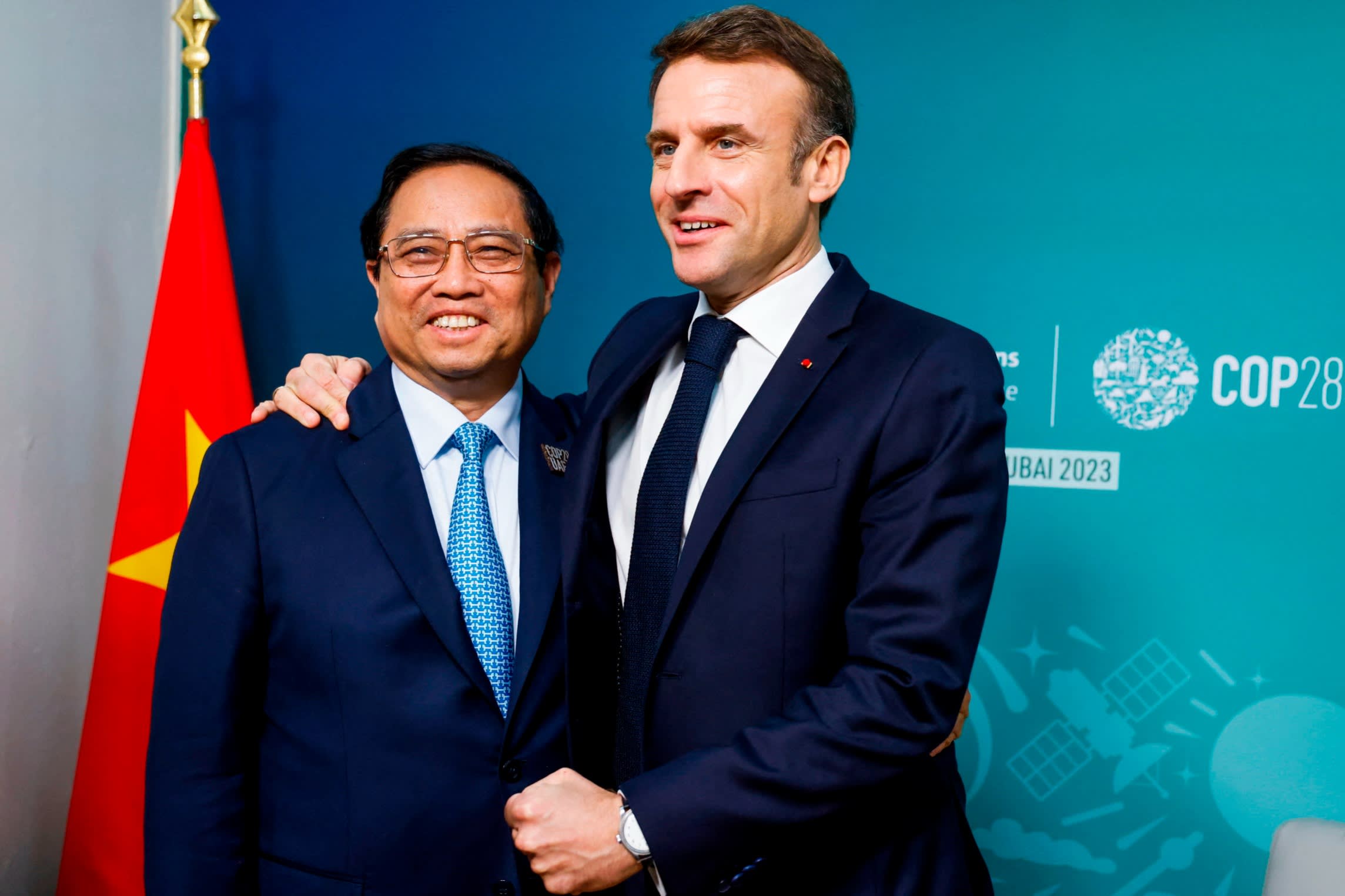 Emmanuel Macron with Vietnam’s Prime Minister Pham Minh Chinh during a bilateral meeting on the sidelines of the COP28 climate summit in Dubai in December 2023