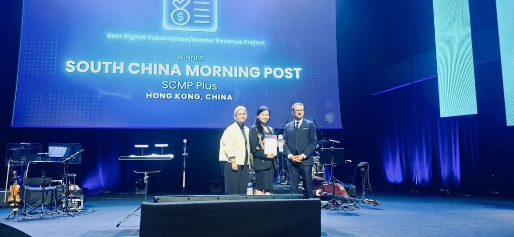 Catherine So (centre), CEO of the South China Morning Post, receiving the trophy in Krakow, Poland. Photo: Wan-IFRA Catherine So (centre), CEO of the South China Morning Post, receiving the trophy in Krakow, Poland. Photo: Wan-IFRA