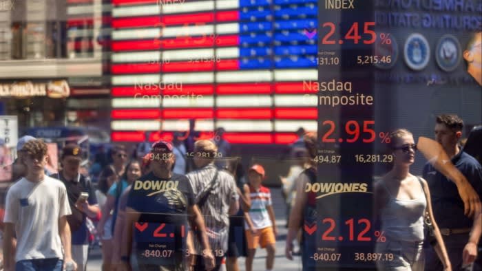 Stock market information displayed at the Nasdaq MarketSite in New York