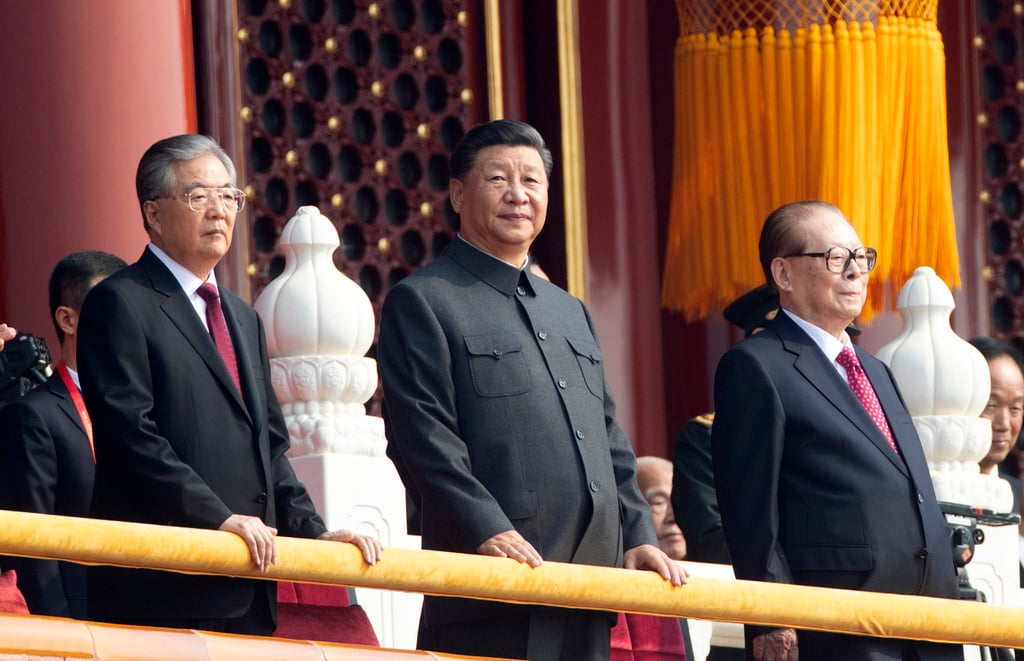 Xi Jinping (centre) with former presidents Hu Jintao (left) and Jiang Zemin at the 2019 parade. Photo: AP