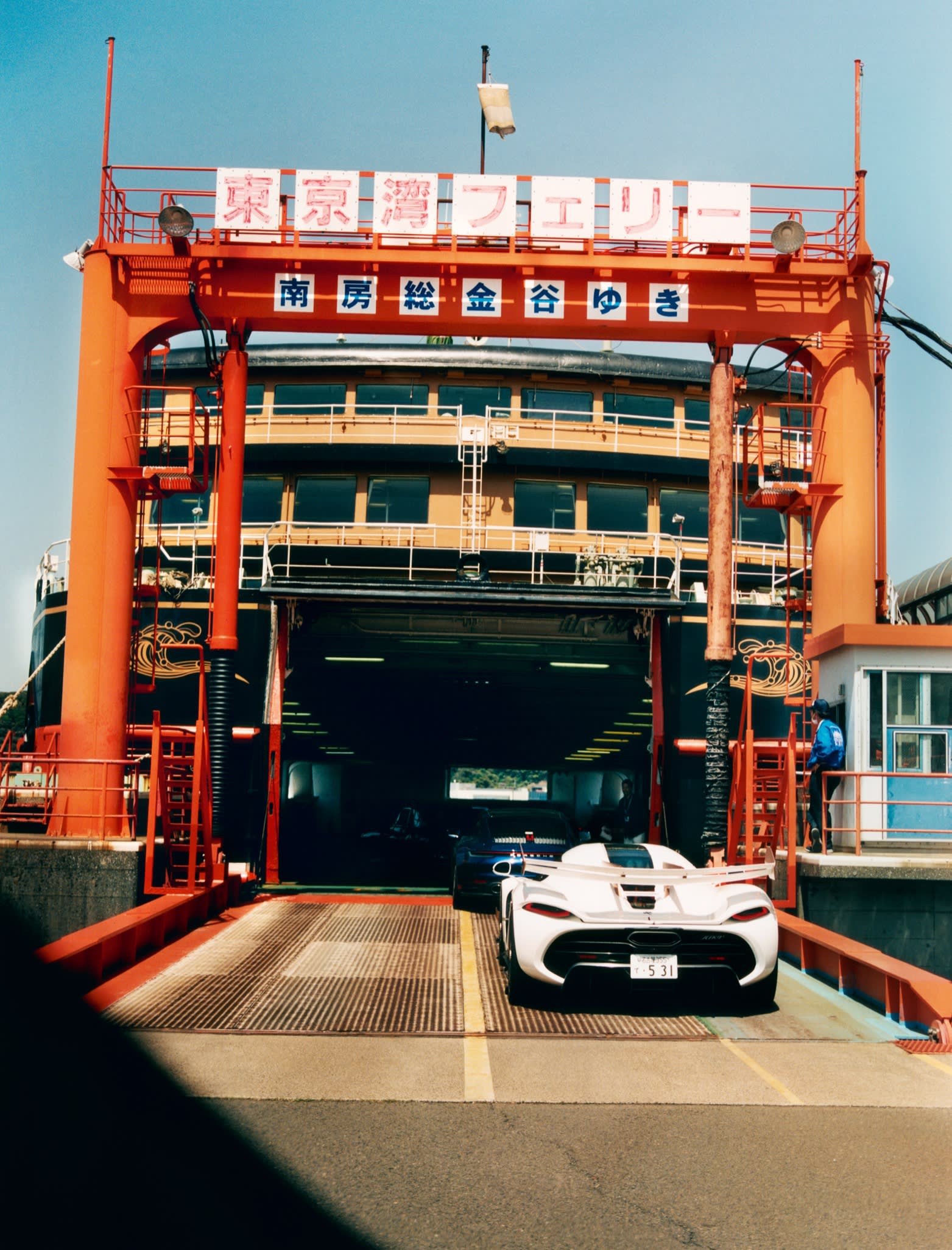 A Koenigsegg Agera loads onto the ferry at Kurihama Port