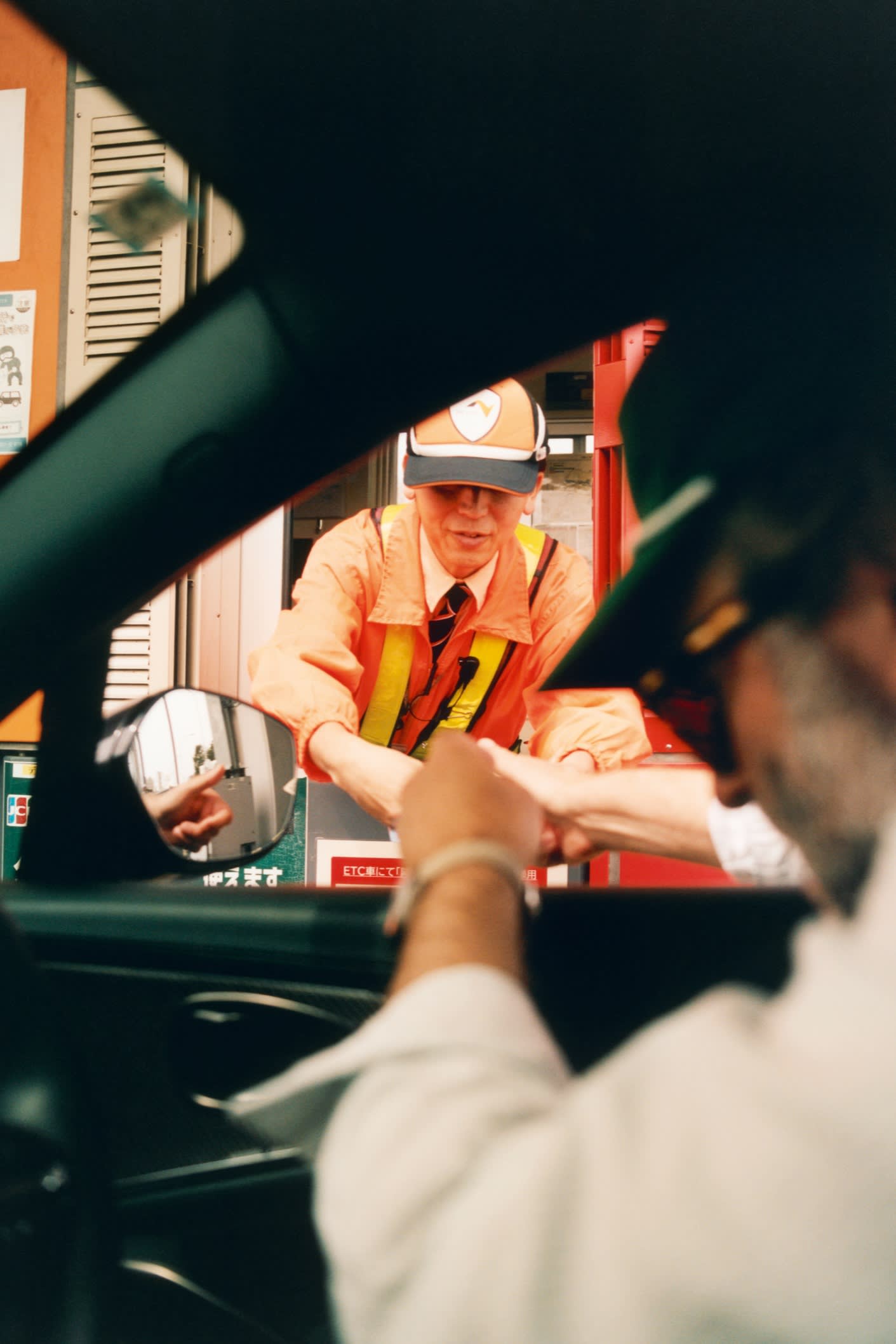 The author pays a tollbooth attendant