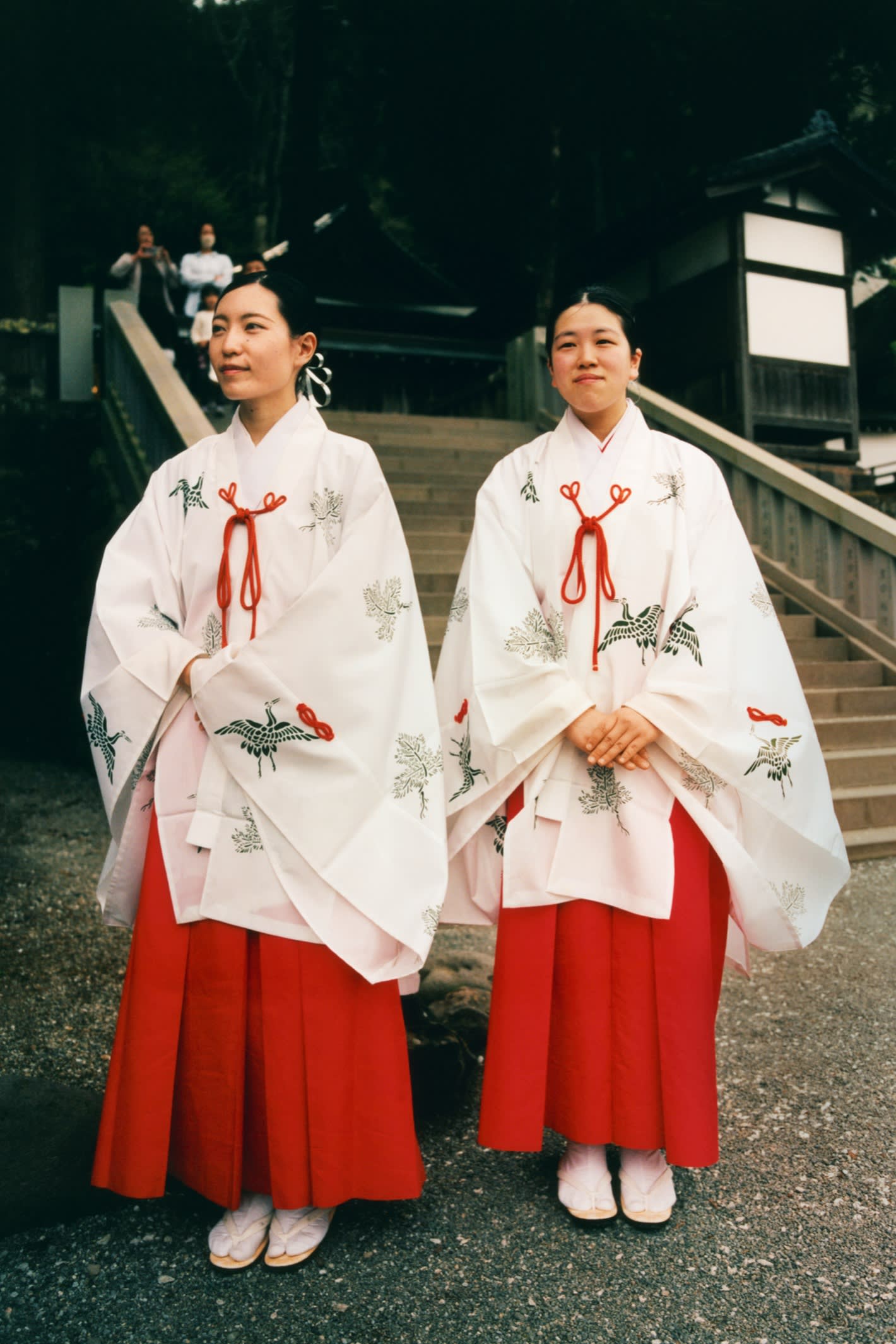 Shinto priestesses outside the Suwa Taisha shrine in Nagano Prefecture