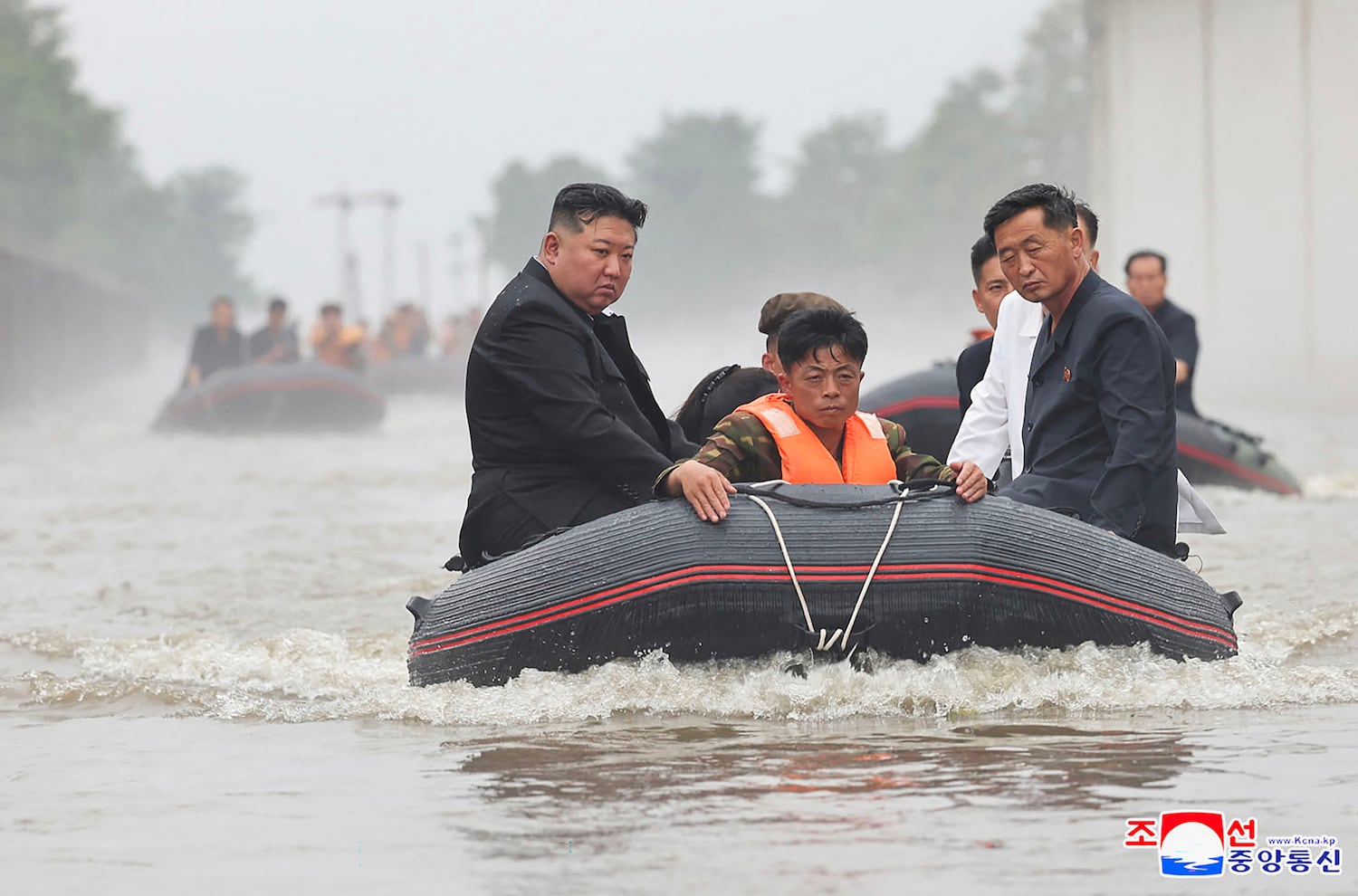 This photo released by North Korea's government on July 31, 2024, and not independently verifiable shows leader Kim Jong Un visiting flooded areas after record-breaking heavy rains in North Pyongan province.