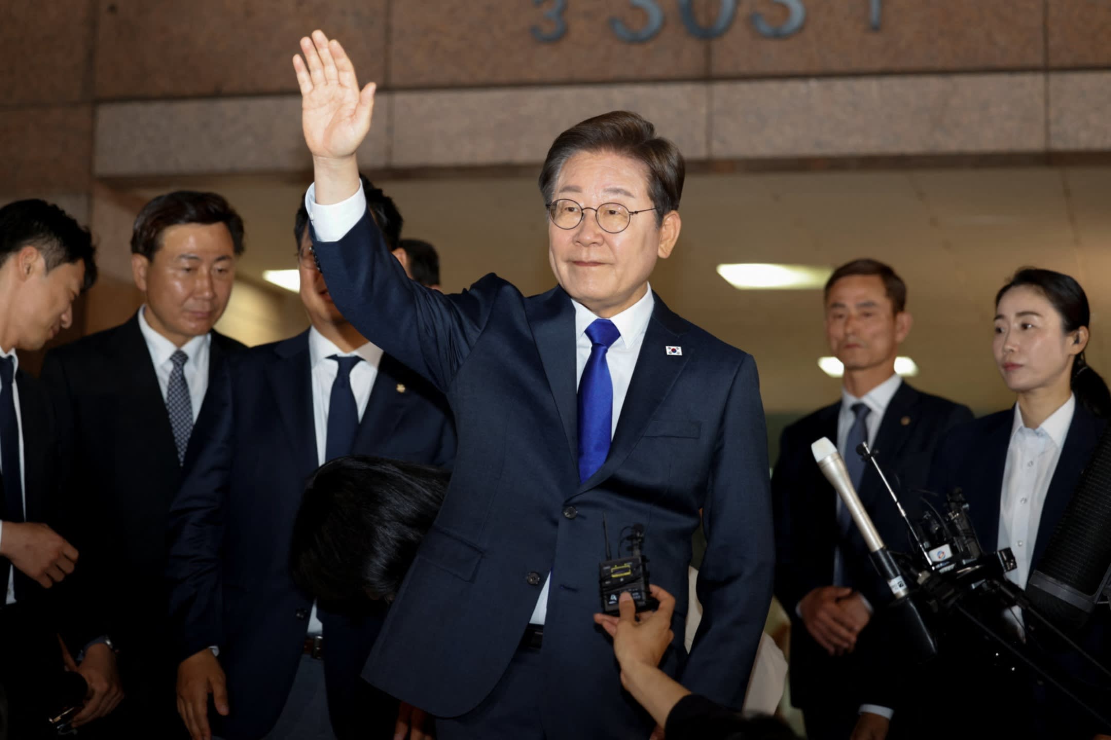South Korea’s President-elect Lee Jae-myung waves as he leaves to meet his supporters, in Incheon