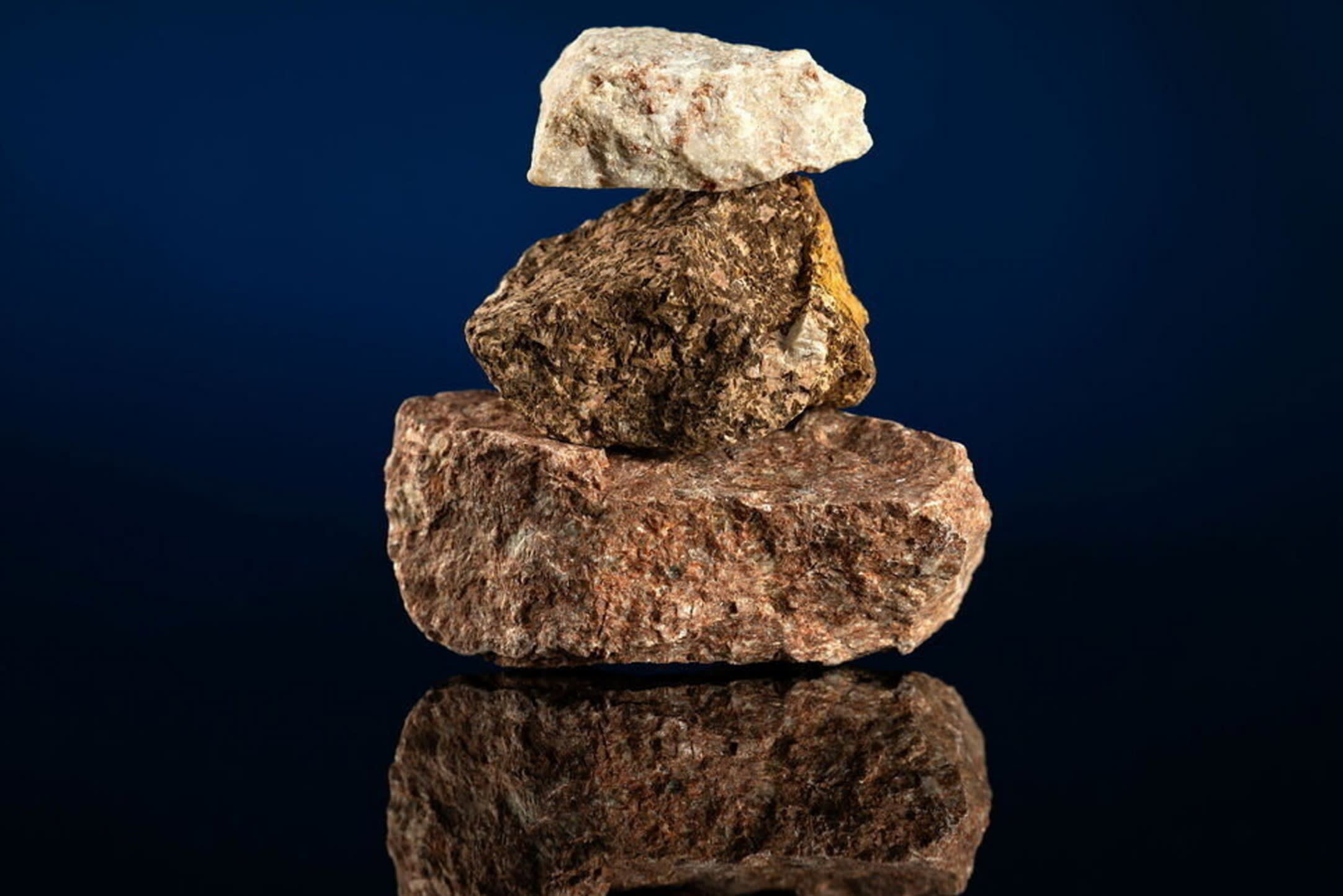 Three rocks balanced one on top of the other