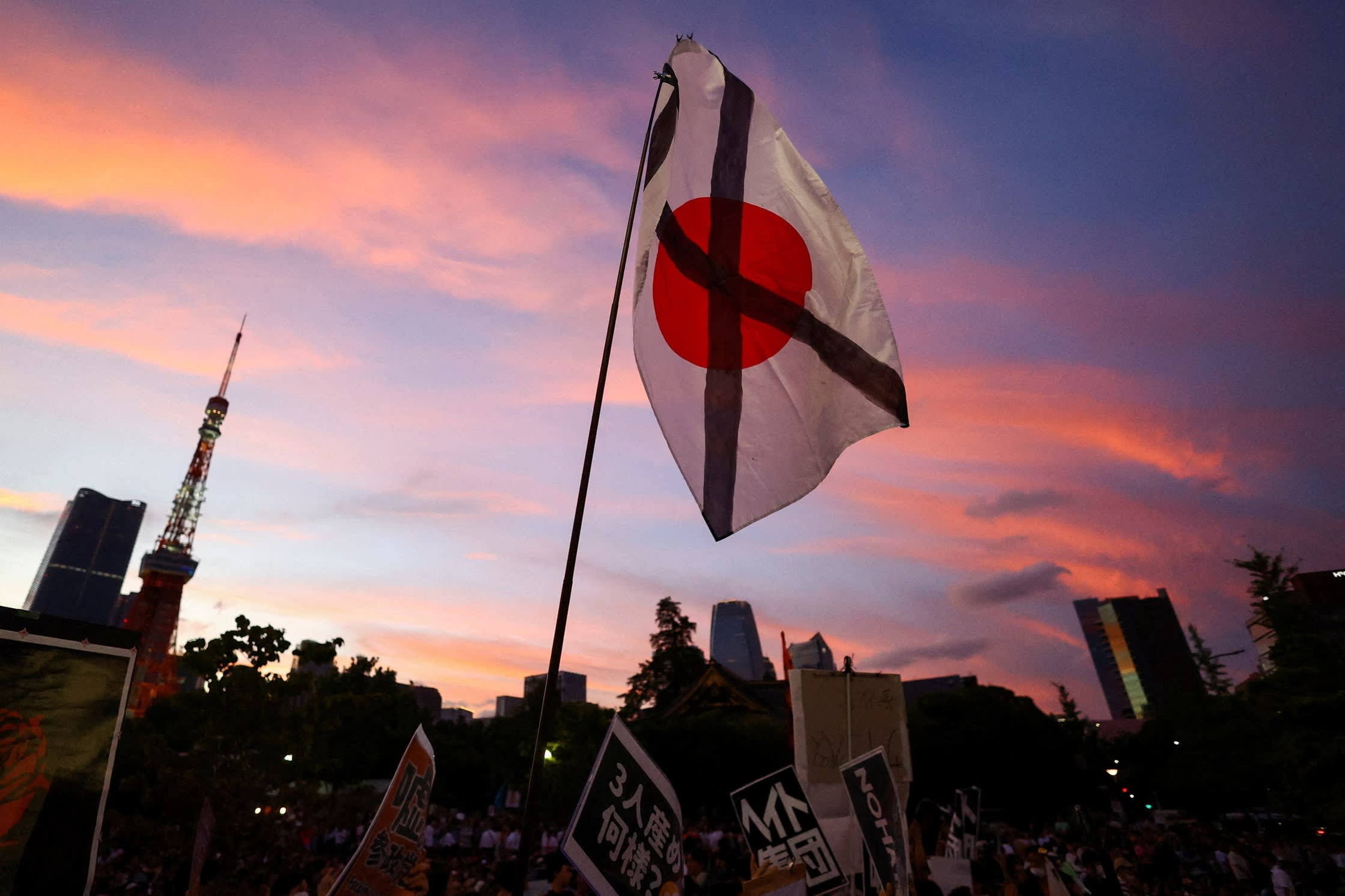 A Japanese national flag with an X on the last day of campaigning on Sunday in Tokyo